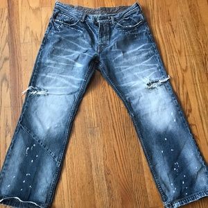 A/X (Armani Exchange) Men’s distressed jeans.